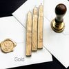 Set of Papier Plume sealing wax sticks with wicks in modern colors, ideal for sealing envelopes and adding a vintage touch.