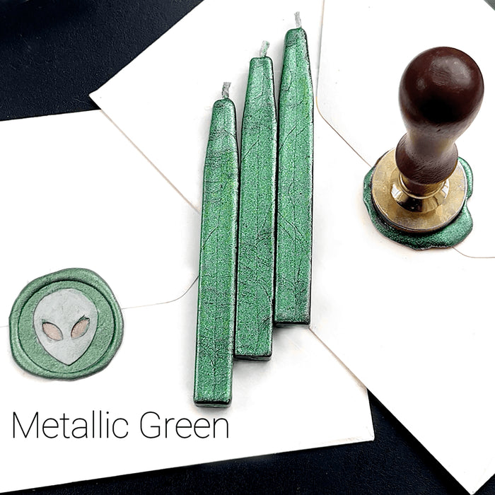 Papier Plume sealing wax sticks with wick in modern colors, showing vibrant wax and a wick for sealing documents or letters.