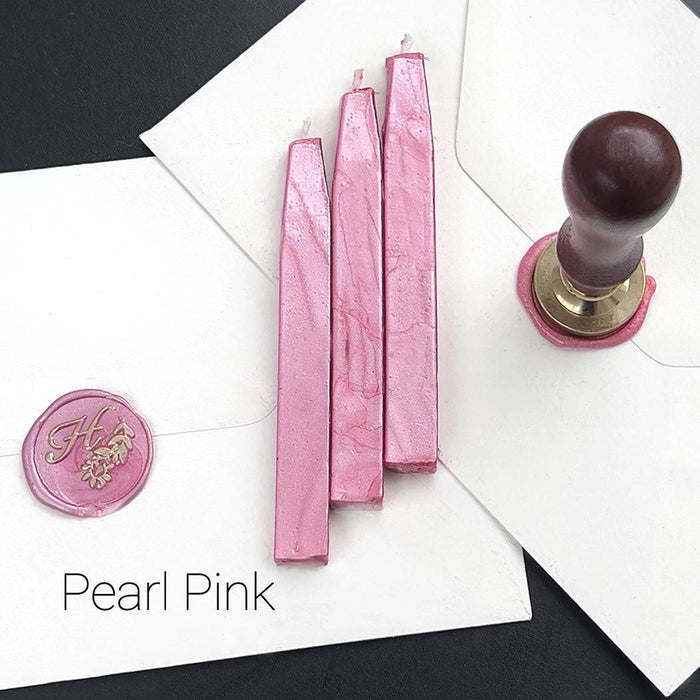 Papier Plume sealing wax sticks with wick in modern colors, showcasing vibrant wax and smooth texture for sealing and craft projects.