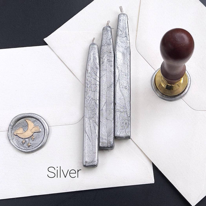 Papier Plume sealing wax sticks with wick in modern colors, showcasing vibrant, smooth wax for sealing and decorative purposes.