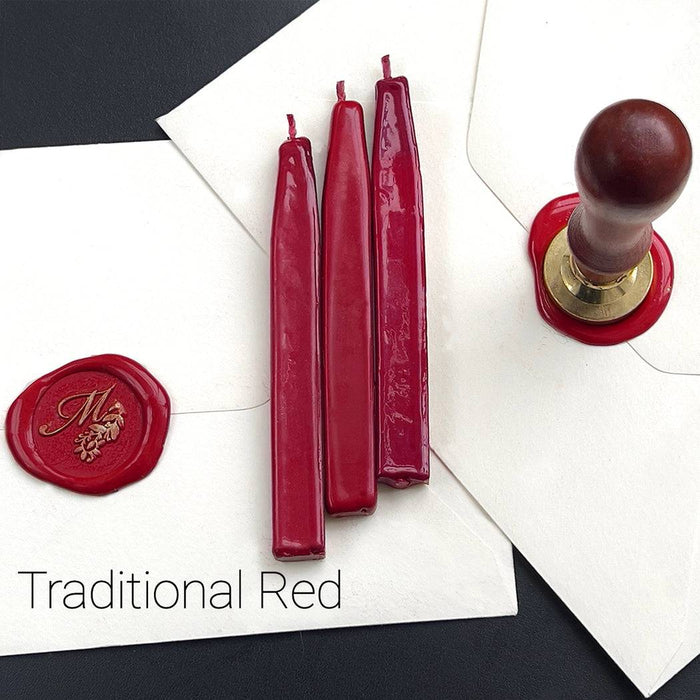 Set of Papier Plume sealing wax sticks with wicks in modern colors, crafted for elegant sealing and decorative embossing.