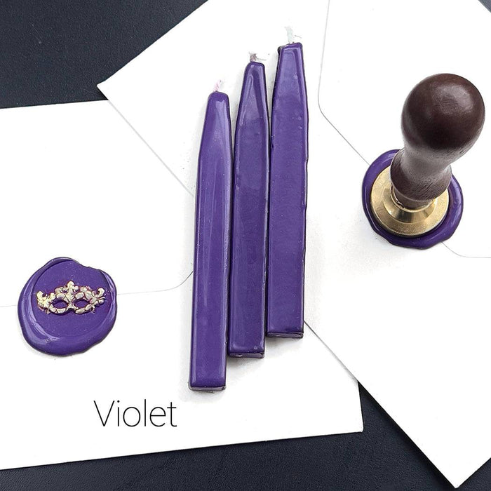 Set of Papier Plume sealing wax sticks with wicks in modern colors, ideal for sealing letters and invitations.