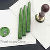 Papier Plume sealing wax sticks with wicks in modern colors, ideal for sealing envelopes and adding a stylish touch to correspondence.