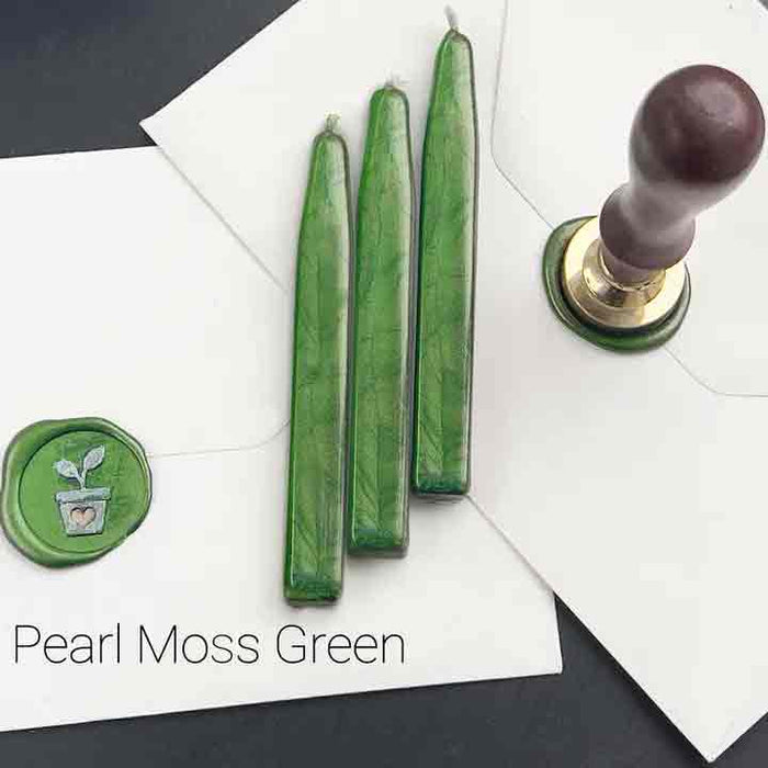 Papier Plume sealing wax sticks with wicks in modern colors, ideal for sealing envelopes and adding a stylish touch to correspondence.