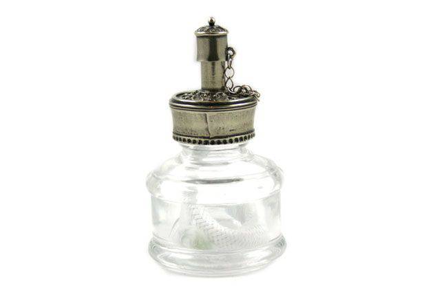 Round Papier Plume Bortoletti sealing wax heater lamp, vintage-style wax lamp with warm glow and decorative design.