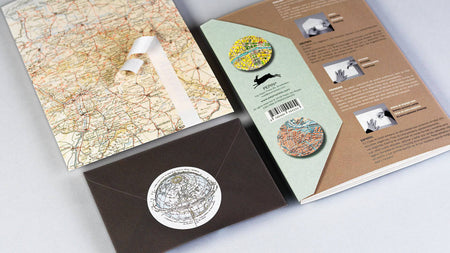 Pepin Press Sticker & Tape Book featuring vintage-style historical maps on pages with colorful stickers and decorative tape designs.