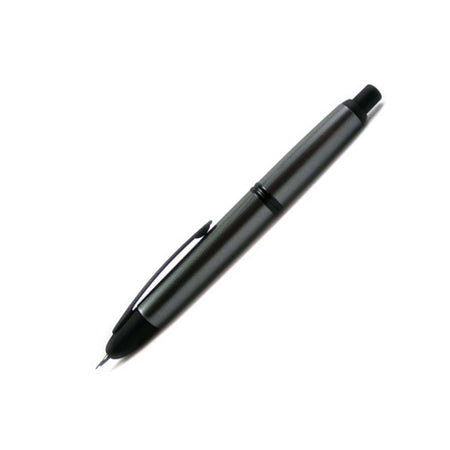 Pilot Vanishing Point fountain pen in gun metal and black matte finish, with a sleek, cylindrical design and fine nib.