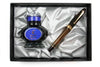 Pilot Custom 823 Smoke fountain pen with gold accents and translucent gray barrel, showcasing a luxurious writing instrument.