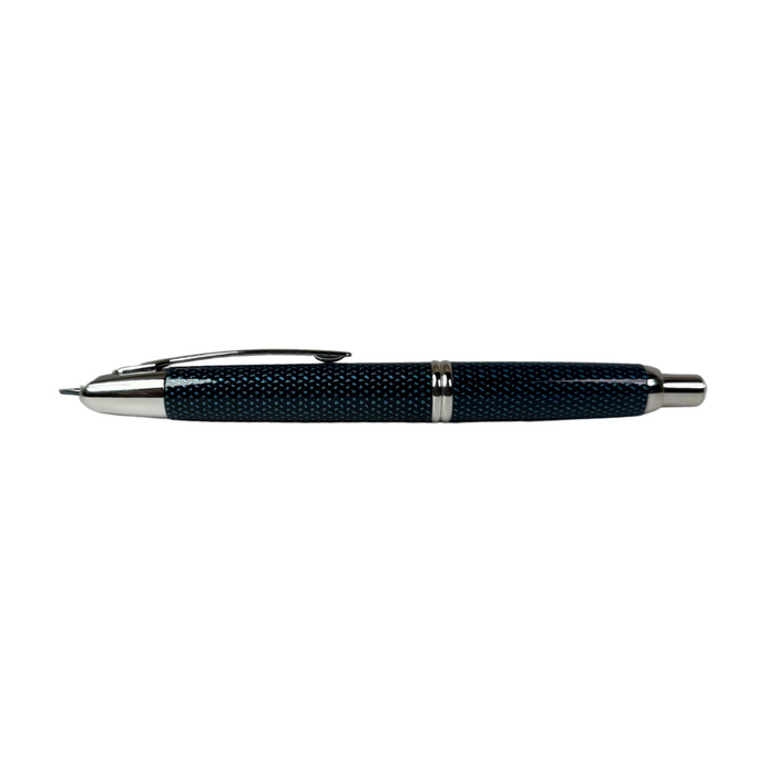 Pilot Vanishing Point fountain pen with blue Carbonesque finish, featuring a sleek, retractable design and gold accents.