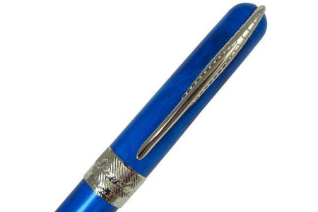 Pineider Avatar UR ballpoint pen in Neptune Blue with sleek design and gold accents, featuring a smooth writing tip.