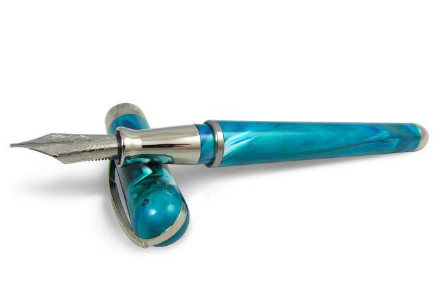 Pineider Avatar UR Fountain Pen in Abalone Green with a sleek, elegant design and gold accents.