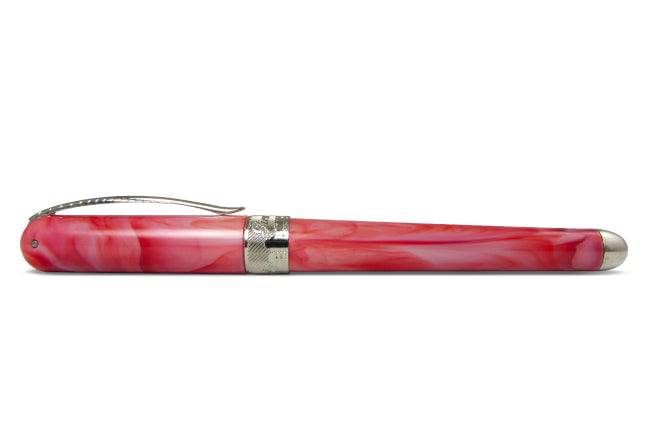 Pineider Avatar UR Fountain Pen in Angel Pink with gold accents, showcasing its elegant design and fine nib.