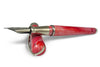 Pineider Avatar UR fountain pen in Angel Pink with an elegant design and fine nib, showcasing a luxurious writing instrument.