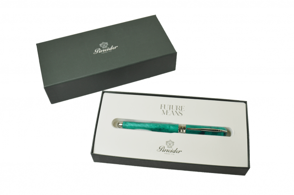 Pineider Avatar UR fountain pen in forest green with gold accents, featuring an elegant design and fine nib for smooth writing.