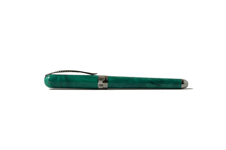 Forest green Pineider Avatar UR fountain pen with gold accents, showcasing its elegant design and fine nib.