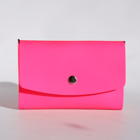 Pink Papier Plume Swatch Book Card Holder made of regenerated leather, featuring a compact, stylish design for holding swatch samples.
