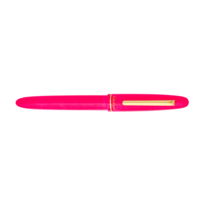 Pink Esterbrook Estie fountain pen in closed position, showcasing its sleek design and vibrant color.