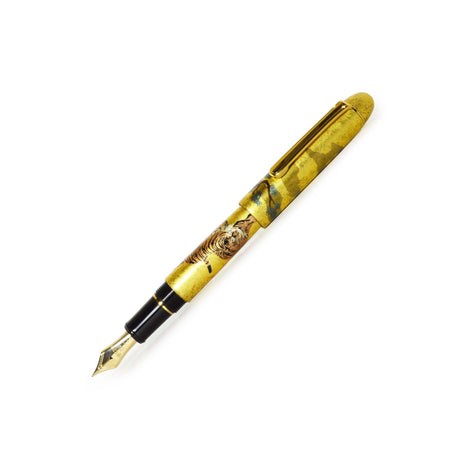 Platinum Century Matsu-Tora fountain pen with gold nib and black resin body, showcasing elegant design and fine craftsmanship.