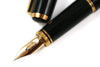 Platinum Maki-e Phoenix fountain pen with intricate gold and lacquer design, fine nib, by Platinum Pen Company.