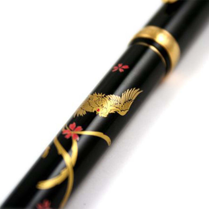 Platinum Maki-e Fountain Pen with intricate phoenix design, fine nib, crafted by Platinum Pen Company.