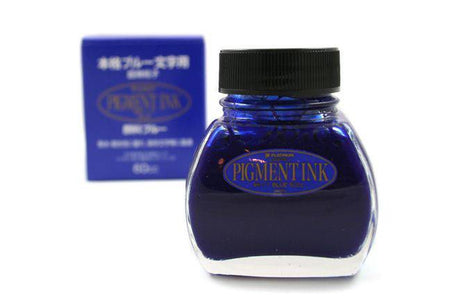 Blue Platinum Pigment Ink for fountain pens by Platinum Pen Company, shown in a clear bottle with ink inside.