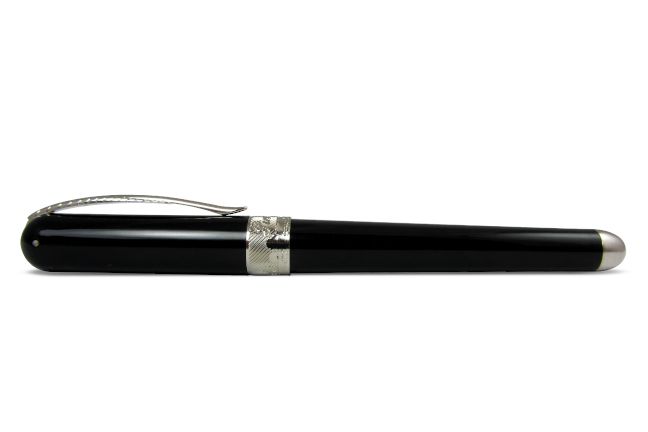 Pineider Avatar UR rollerball pen in sleek graphene black with metallic accents, showcasing its elegant design and smooth grip.