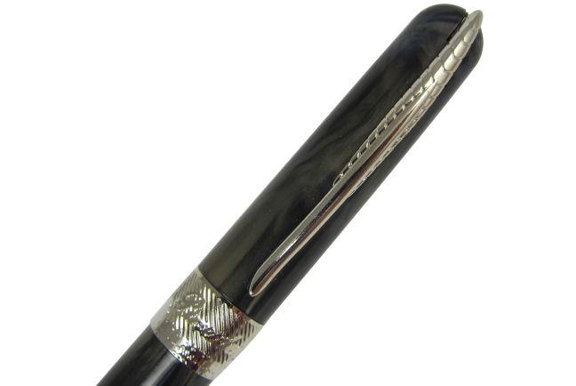 Pineider Avatar UR rollerball pen in Riance Bronze with sleek design and metallic finish, positioned on a white background.