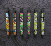 Retro 51 Dino Fossil Tornado rollerball pen with a fossil-inspired design on a sleek metallic barrel.