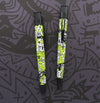 Retro 51 Dino Fossil Tornado rollerball pen with detailed dinosaur fossil design and sleek metal body.