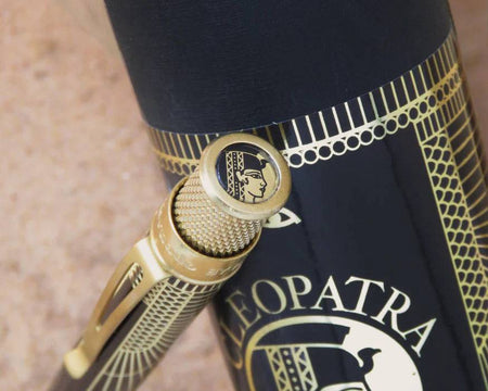Retro 51 Tornado Vintage Metalsmith Cleopatra rollerball pen with metallic finish and vintage-inspired design.
