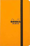 Black Rhodia Unlimited Pocket Notebook open to lined pages, compact and portable for on-the-go note-taking.