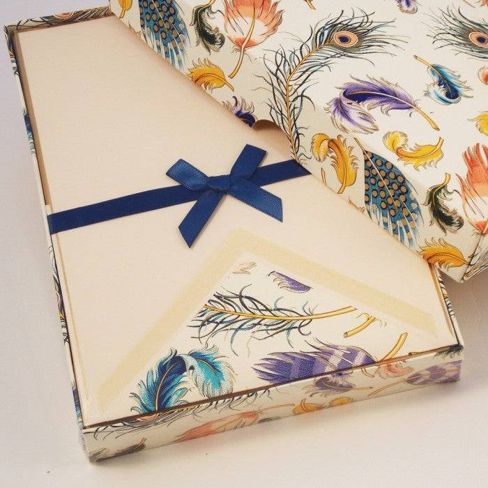 Rossi feather notecards featuring elegant stationery design with feather illustrations, ideal for writing notes or greetings.