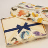 Rossi feather notecards featuring elegant feather designs, ideal for writing notes and personal correspondence.