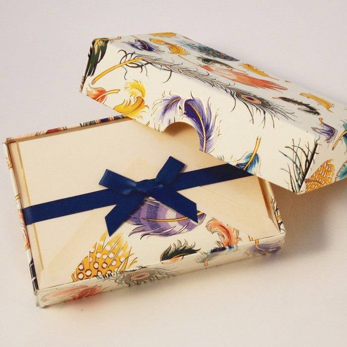 Set of Rossi Feather Notecards featuring elegant feather designs on high-quality stationery for writing notes and messages.