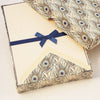 Rossi peacock notecards featuring elegant stationery with peacock feather designs on high-quality paper.