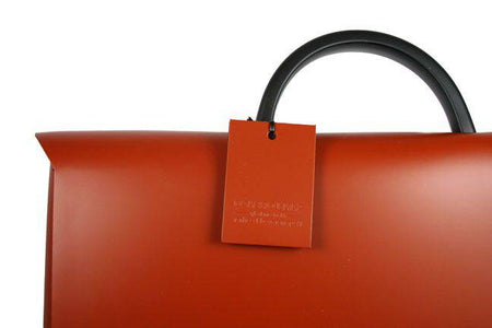 Dark blue San Lorenzo regenerated leather briefcase with handles and silver hardware, classic convention style for professionals.