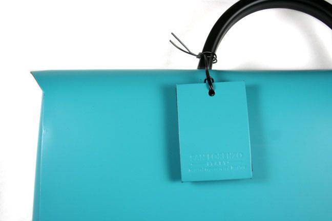 Dark blue San Lorenzo regenerated leather convention briefcase showing sturdy handles and sleek design.
