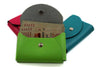 San Lorenzo small business card holder made of pink regenerated leather, featuring a compact design and smooth texture.