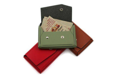 Pink San Lorenzo wallet made from regenerated leather, designed for business and credit card storage, with multiple card slots.