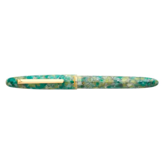 Esterbrook Estie fountain pen with gold fittings, featuring a sea glass-colored resin barrel and a sleek, elegant design.