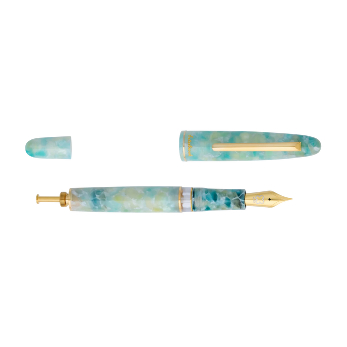 Open Esterbrook Estie push button fountain pen with seaglass-colored resin body and gold accents.