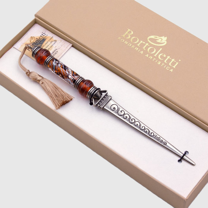 Bortoletti letter opener with amber-colored handle, elegant design, and metal blade for opening envelopes smoothly.