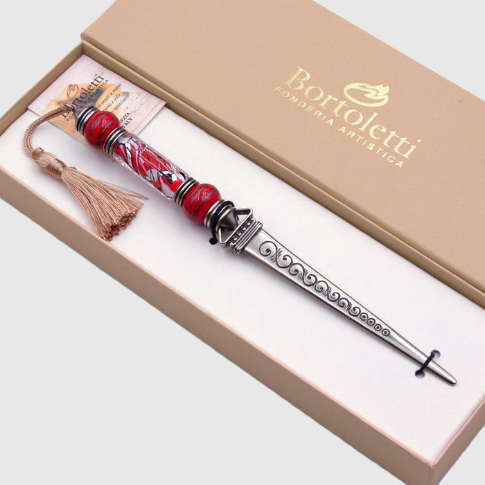 Bortoletti letter opener with red handle and gold detailing, sleek and elegant design for opening envelopes and letters.