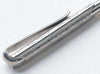 Sterling silver ballpoint pen by The Wallet Pen Company, sleek and elegant writing instrument with a shiny metallic finish.