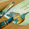 Esterbrook x BUNGUBOX Kingfisher Estie fountain pen with vibrant blue and gold accents, detailed close-up of the limited edition design