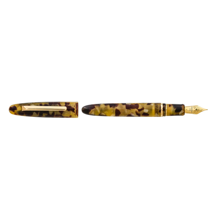 Esterbrook Estie fountain pen with tortoise resin body and gold fittings, showcasing its elegant design and luxurious finish.