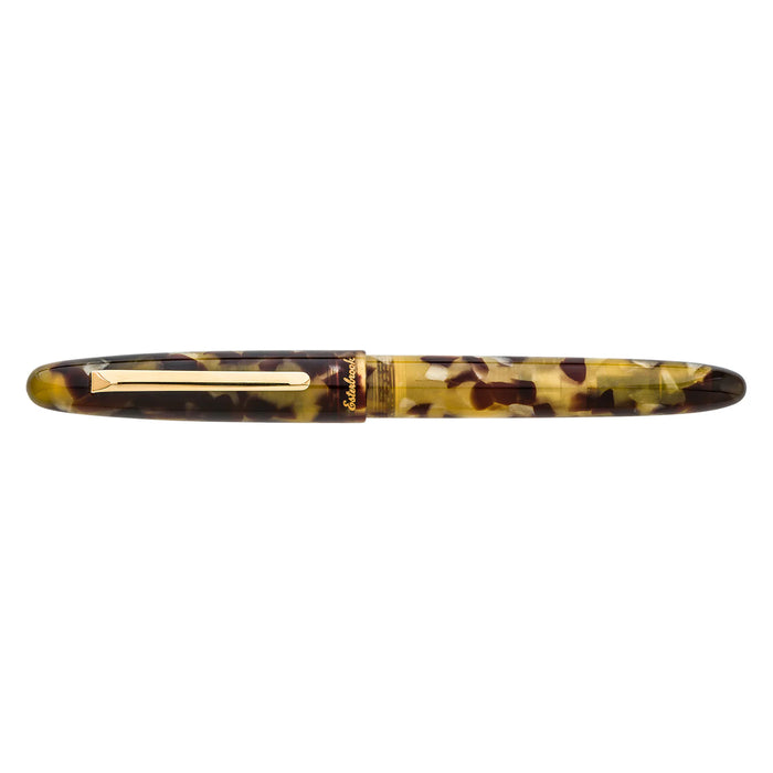 Esterbrook Estie fountain pen with tortoise shell body and gold fittings, featuring a smooth writing nib and elegant design.