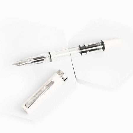 Twsbi Eco White fountain pen with extra-fine steel nib, sleek design, and smooth ink flow for writing.