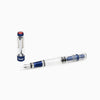 Twsbi Diamond 580 ALR fountain pen in navy blue with gold accents and extra-fine nib, showcasing its sleek design and elegant finish.