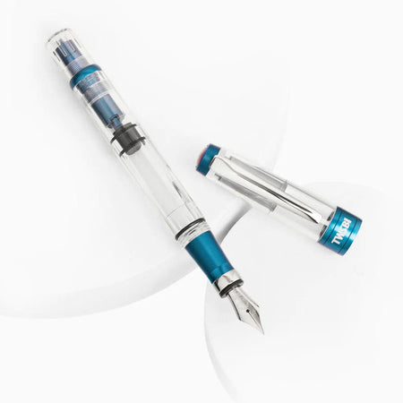 Twsbi Diamond 580 ALR Prussian Blue fountain pen with gold accents, detailed close-up of the pen's body and cap.